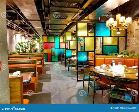 Restaurant With Coloured Glass Partition Royalty Free Stock Photo