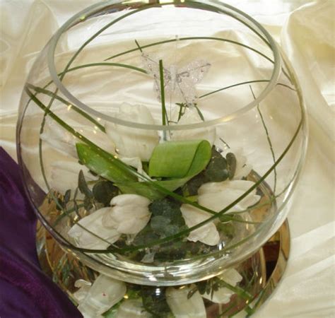 Tulip Eucalyptus And Bear Grass Centerpiece Grass Centerpiece Glass Vase Vase