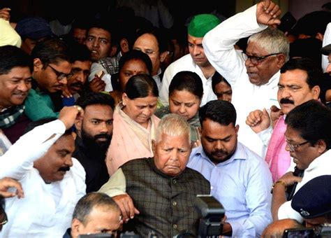 Former Bihar Cm And Rjd Leader Rabri Devi With Party Chief Lalu Prasad