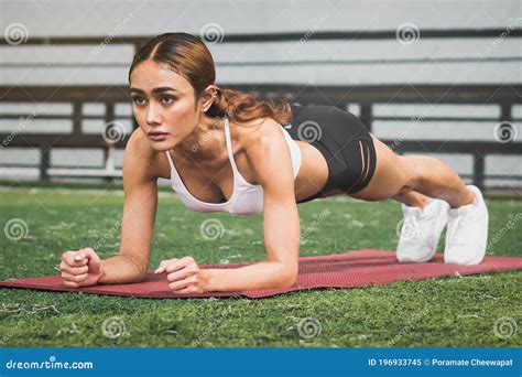 Woman Doing Plank Exercise On The Yoga Mat Stock Image Image Of