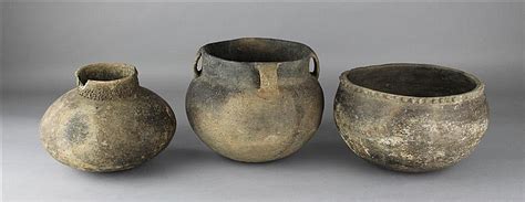 Lot - FOUR WOODLAND PERIOD POTTERY VESSELS, 1200 - 1500 AD