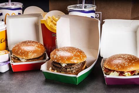 Burgers With French Fries Cola And Sauces From Mcdonald S Restaurant