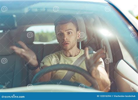 Angry Emotional Man Driving His Car Without Knowing The Road Stock