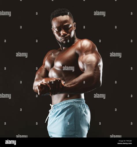 Man Flexing Muscle Black Stock Photos Man Flexing Muscle Black Stock