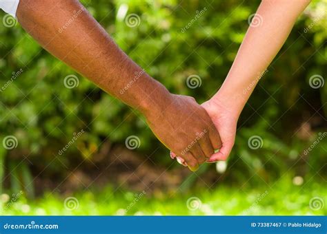 Arms Of Interracial Couple Holding Hands Great Love Symbolic Concept