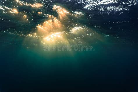 Rays Of Light Shining Through The Surface Of The Atlantic Ocean Into