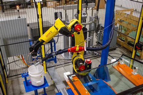 Robotic Adhesive Dispensing Cell Case Study Pioneer Industrial Systems