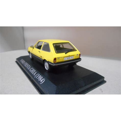 FORD FIESTA GHIA 1984 AMARILLO YELLOW MATRICULA ESPAÑA 1 43 ALTAYA IXO