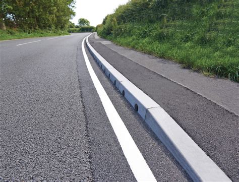 Combined kerb and drainage improves busy A road | Marshalls | ESI ...