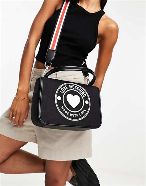 Love Moschino Circle Logo Top Handle Canvas Cross Body Bag In Black Asos