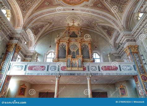 Interior Of A Catholic Church In South Tyrol With Numerous Ornate