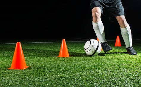 Soccer Practicing Cone Skill Stock Photos Pictures And Royalty Free