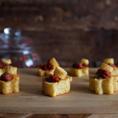 Aperitivo De Patatas Cebolla Caramelizadas Y Spanishchorizo