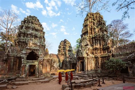 Buddhist Monks Walking With Umbrella In A Temple Royalty Free Image