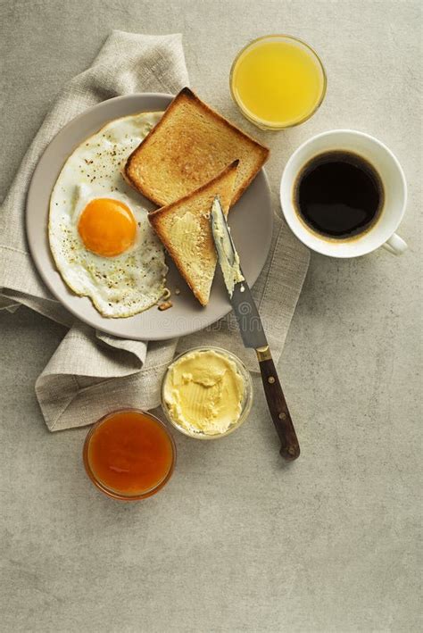 Breakfast with Egg, Jam, Butter, Juice and Coffee Stock Photo - Image of brunch, cuisine: 164231548