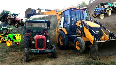 Jcb Dx Machine Backhoe Loading Mud In Trolley Massey Tractors