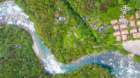 Bird's eye view of Dulong River: A wooden village alongside the river ...