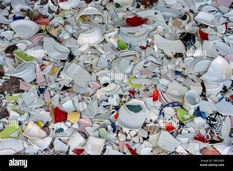 broken porcelain tableware, wedding custom Stock Photo - Alamy