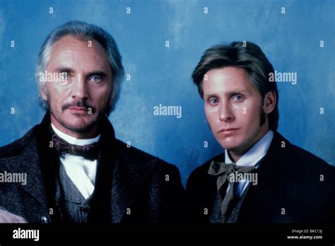 YOUNG GUNS (1988) TERENCE STAMP, EMILIO ESTEVEZ YNG 039 Stock Photo - Alamy