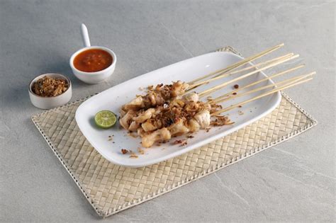 Premium Photo Sate Taichan Grilled Chicken Satay With Salt And Fried