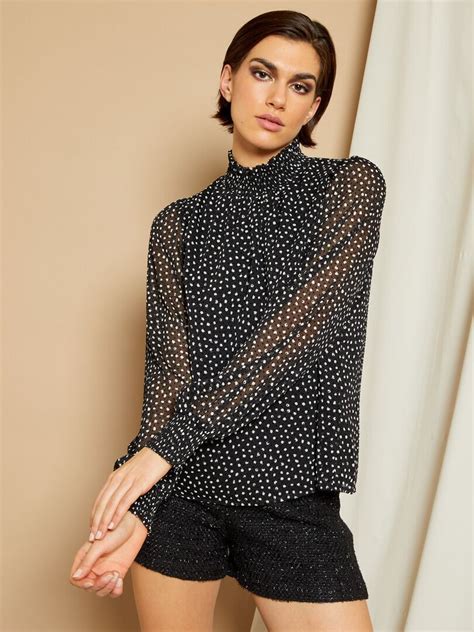 Blusa Con Plumeti NEGRO Kiabi 20 00