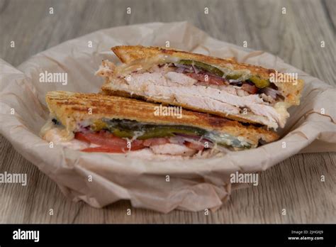 Grilled Panini Sandwich With Chicken And Mayo On Sour Dough Bread