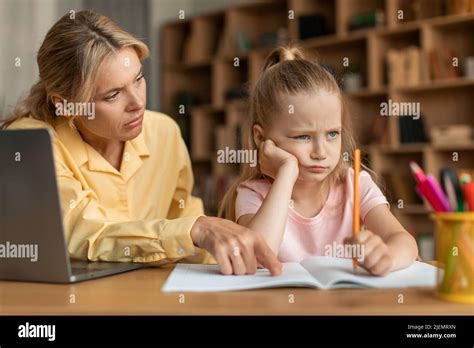 Strict Mother Scolding Upset Daughter For Bad Marks Or School Exam Results Mum Lecturing