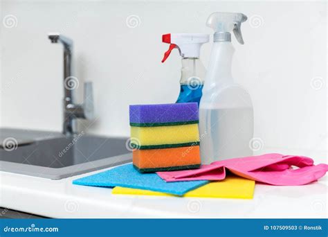 Kitchen Cleaning Products and Equipment on White Worktop Stock Image ...