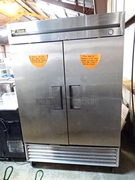 True Model T 49f Stainless Steel Commercial Two Door Reach In Freezer On Commercial Casters