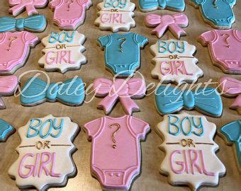 Baby Shower Cookies Are Arranged On A Table