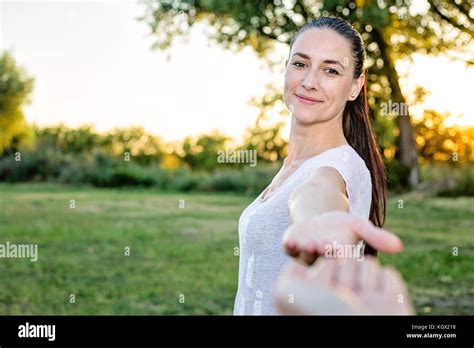 Woman Reaching Up To Camera Telegraph