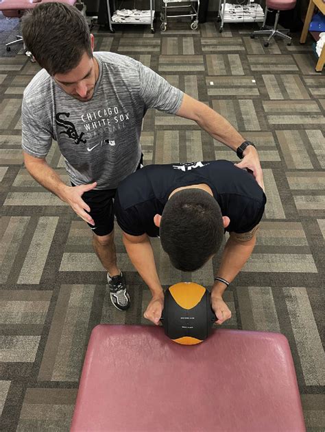 Push Ups On An Unstable Surface With Rhythmic Stabilizations Applied To