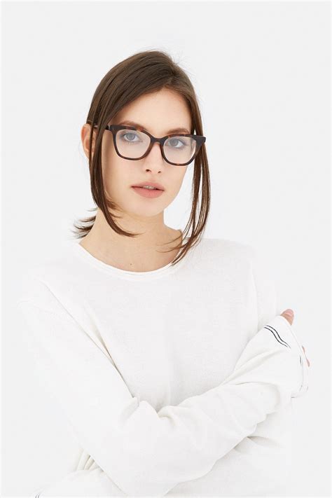 The Retro Super Future Numero 54 Eyeglasses Features Wide Lenses With A Subtle Cat Eye Design