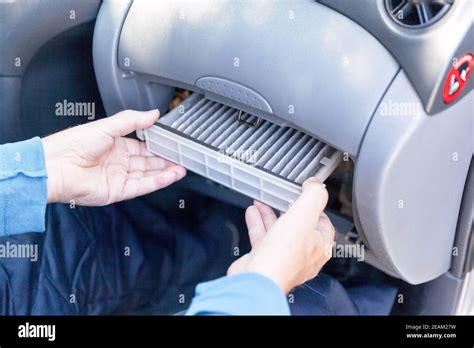 Replacing Dirty Cabin Pollen Air Filter For A Car Stock Photo Alamy