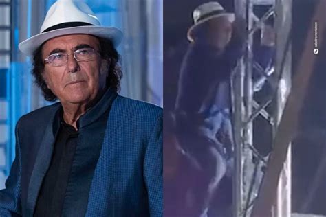 Al Bano Si Arrampica Su Un Traliccio Durante Un Concerto