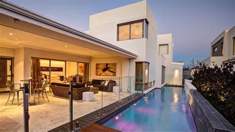 The modern two-storey house Lynix with a garage and a balcony