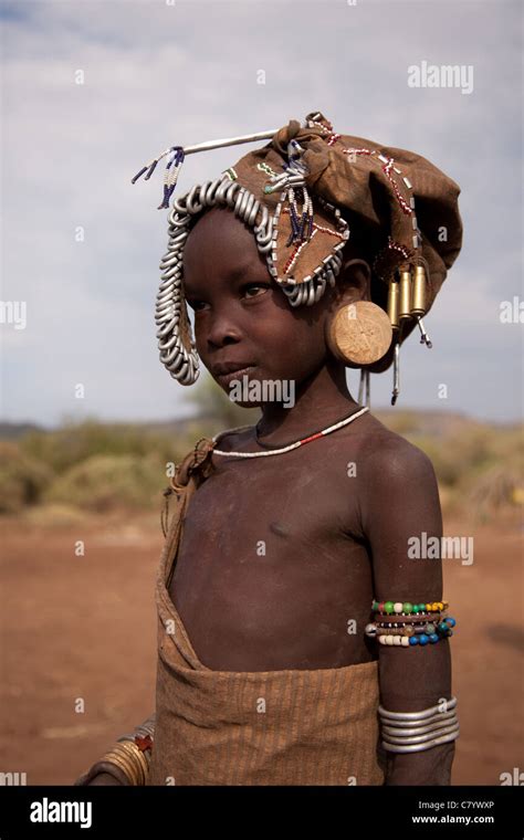 Young Mursi Girl In Traditional Dress Jinka Omo Valley Ethiopia