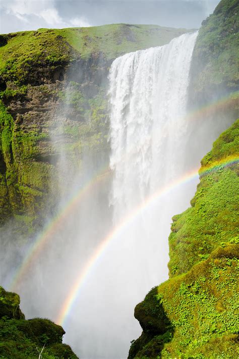 Skogafoss waterfall in Iceland with two rainbows Photograph by Matthias ...