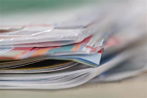 Premium Photo Close Up Of Papers On Table