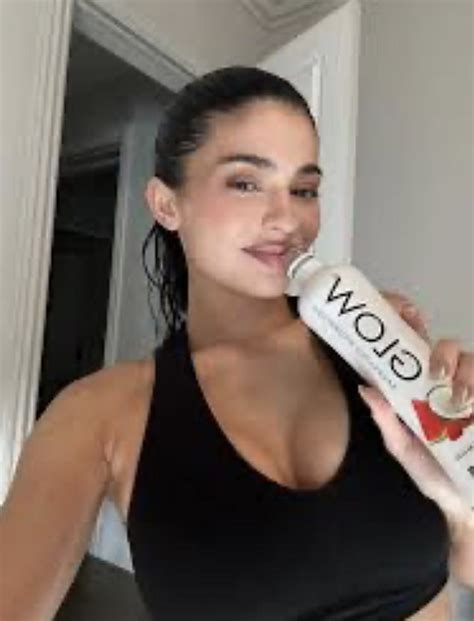 Kylie Jenner Stuns In An Itty Bitty Orange Bikini As She Promotes Her Glow Hydration Drink