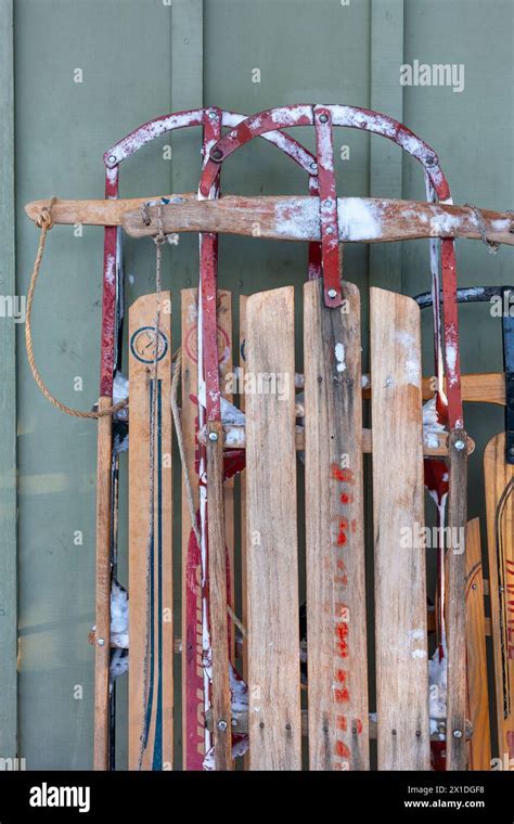 Vintage Wooden Sleds With Snow Stock Photo Alamy