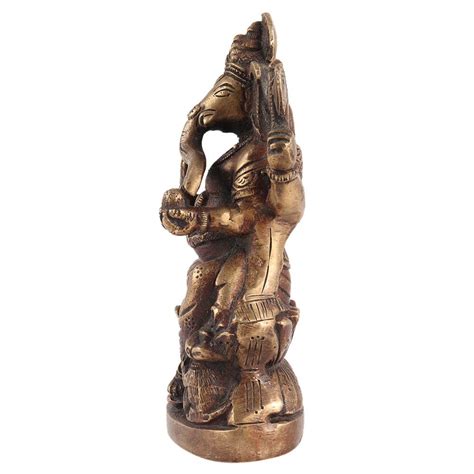 Brass Lord Ganesh Sitting On Lotus Base With Mushak