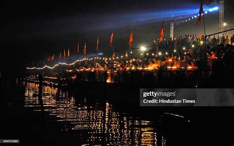 Devotees offering first-ever Yamuna Aarti at Kudesia Ghat, on the ...