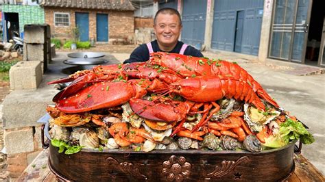 2700买4只波龙45斤海鲜，做海鲜大咖堆成山，农村20几人海鲜当饭吃 腾讯视频