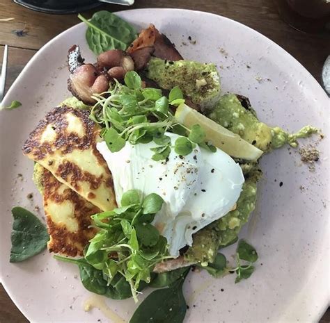 Smashed Avo With Feta Poached Eggs Bacon And Halloumi I Ate Bacon Egg Avo Halloumi Poached