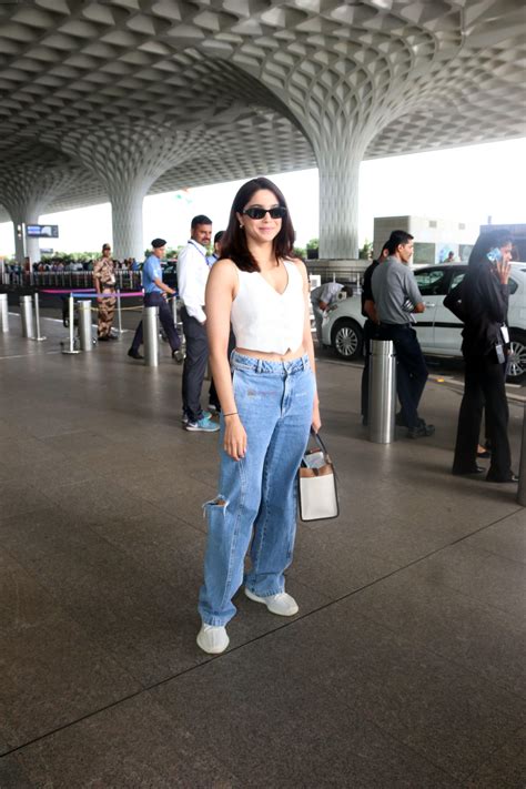 Sharvari Wagh Dressed In White Sleeveless Top And Blue Jeans Seen At