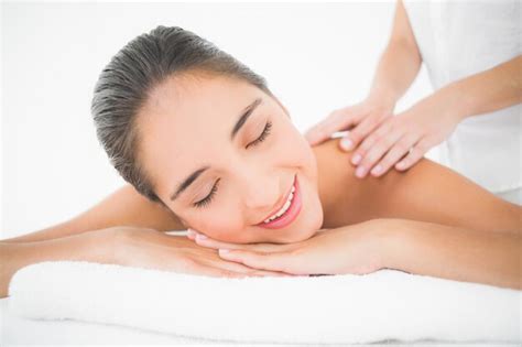 Premium Photo Attractive Woman Receiving Back Massage At Spa Center