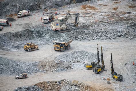 Work of Trucks and the Excavator in an Open Pit on Gold Mining Stock Image - Image of mineral ...