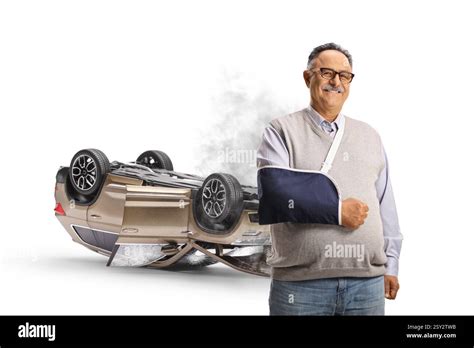 Mature Man With A Broken Arm From A Car Accident Isolated On White