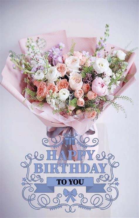 A Bouquet Of Flowers With The Words Happy Birthday To You